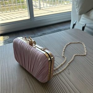 Elegant Pink Clutch with Gold Accents